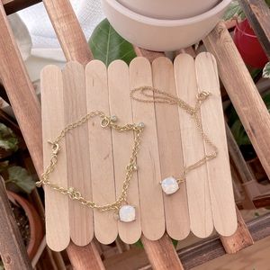 Handmade necklace and charm bracelet set